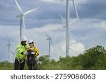 wind turbine, engineer and Workers concept. Windmill engineers inspection and progress check wind turbine power plant. Renewable energy with wind generator by alternative energy concept.