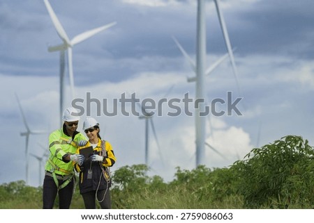 wind turbine, engineer and Workers concept. Windmill engineers inspection and progress check wind turbine power plant. Renewable energy with wind generator by alternative energy concept.
