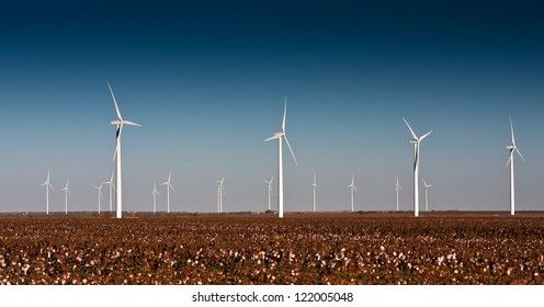 A Wind Turbine Farm In A Cotton Field In Rural West Texas