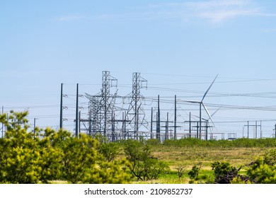 Wind Turbine Farm Generator And Power Station Electricity Grid Near Snyder Texas In USA In Prairie With Many Machines For Energy