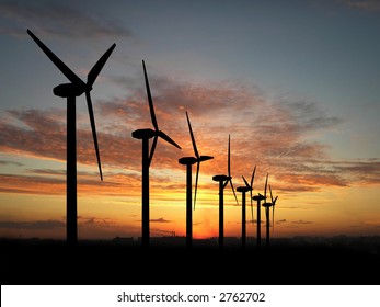 Wind Turbine Farm Over Sunset