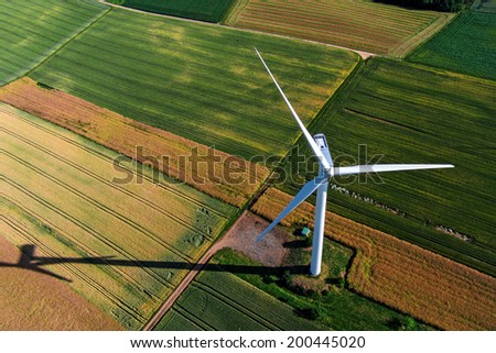 Wind turbine on a field, aerial photo