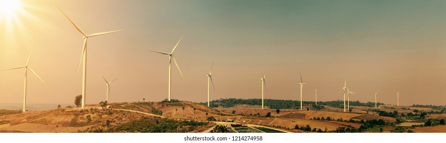 wind turbine on hill with sunlight. concept eco power energy in nature