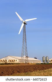 Wind Turbine On A Hog Farm In Iowa