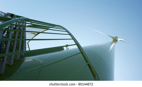 Wind Turbine On A Sunny Summer Afternoon.  Wide Angle.