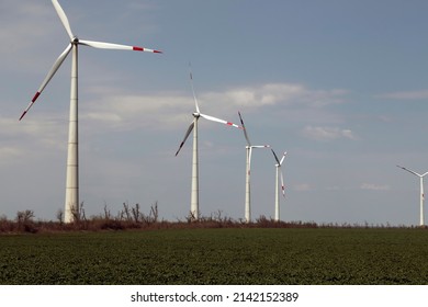 Wind Turbine Replaces Old Coal Plant With High Voltage Power Line For Clean Energy