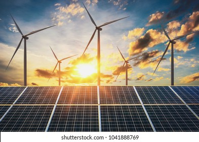 wind turbine with solar panels and sunset. concept clean energy - Shutterstock ID 1041888769
