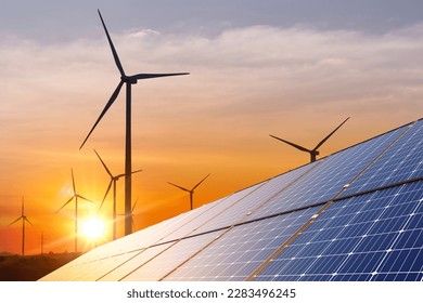 wind turbine with solar panels and sunset. concept clean energy. Energy supply, wind turbine,eolic turbine, distribution of energy,Powerplant,energy transmission,high voltage supply concept
