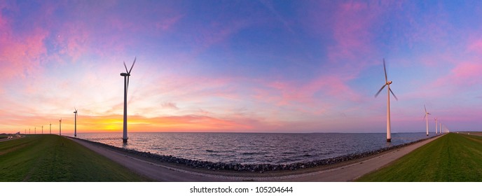 Wind turbine sunset panorama - Shutterstock ID 105204644