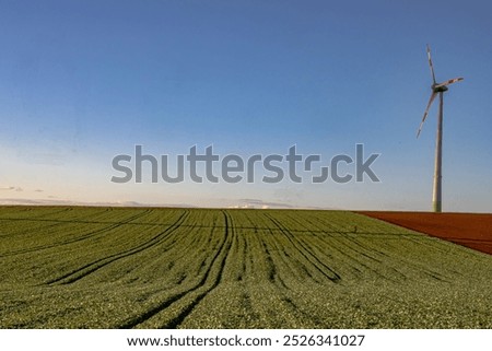 Similar – Sommer August Feld zur Erntezeit bei Sonnenuntergang Sonnenlicht