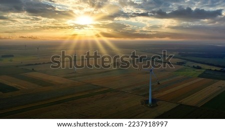 Wind turbines with beautiful sunset sky, zorlu energy wind turbines installed in jhimpir near gharo sindh Pakistan. renewable energy, green energy