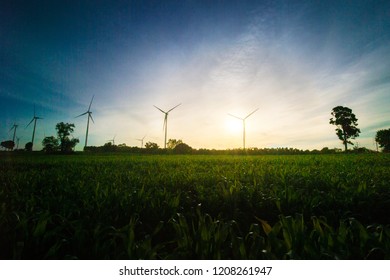Wind turbines convert to electric power and are friendly to nature. - Shutterstock ID 1208261947