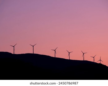 Wind turbines during sunset, Galaxidi, Greece. High quality photo - Powered by Shutterstock