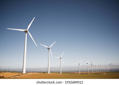 Wind turbines for electric power production, Zaragoza Province, Aragon in Spain. - Powered by Shutterstock