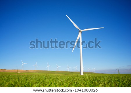 Similar – Windkraftanlage, Windgenerator mit Graffiti Malerei.