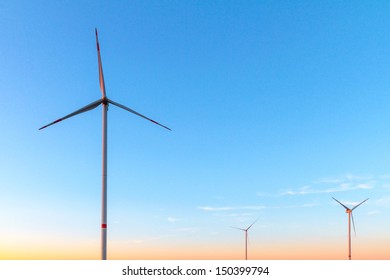 Wind Turbines in the evening in high summer August Germany.