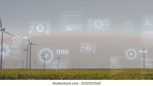 Wind turbines in field with digital data processing image over landscape. Renewable, energy, wind power, sustainability, green energy, technology