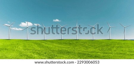 Similar – Foto Bild Windräder in hügeliger Landschaft mit Bäumen und abgeernteten Feldern / Frühherbst