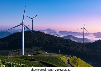 Wind turbines landscape on top of alpine region at beautiful sunrise. Taebaek-si, Gangwon-do, South Korea. - Shutterstock ID 2193272781