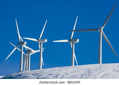 wind turbines on snow landscape