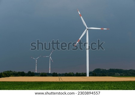 wind turbines in rainy weather
