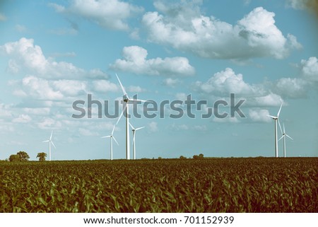 Similar – Foto Bild Windräder am Horizont unter dramatischem Himmel