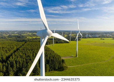 Wind turbines in a rural field on a summer day - Powered by Shutterstock