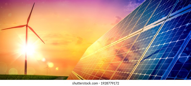 Wind Turbines And Solar Panels At Sunset - Renewable Energy Concept