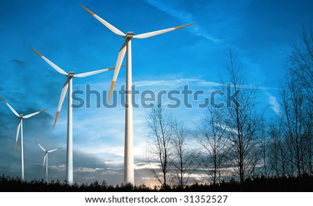 Wind turbines at sunset