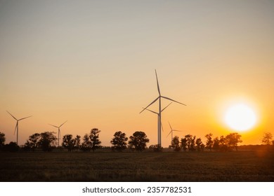 wind turbines at sunset, nature - Shutterstock ID 2357782531