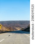 Wind turbines windmills at Appalachian mountains ridge, West Virginia Canaan valley on Sugarlands highway road with scenic moon landscape