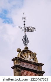 wind vane on the roof of a medieval building