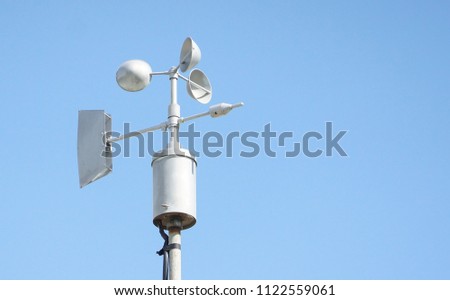 Wind vanes with blue sky background