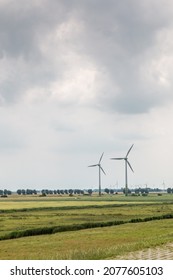 Wind wheels for renewble energy on the flat marshland of North Germany
