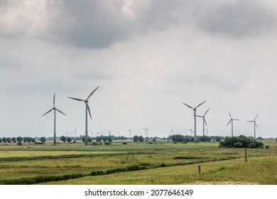 Wind wheels for renewble energy on the flat marshland of North Germany