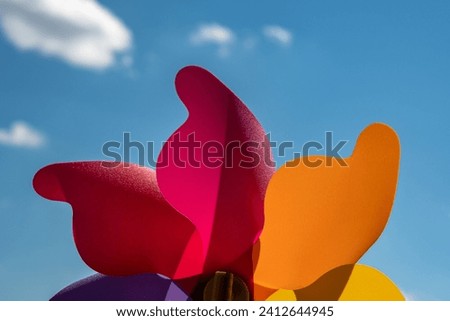 Windchime with clouds and blue sky