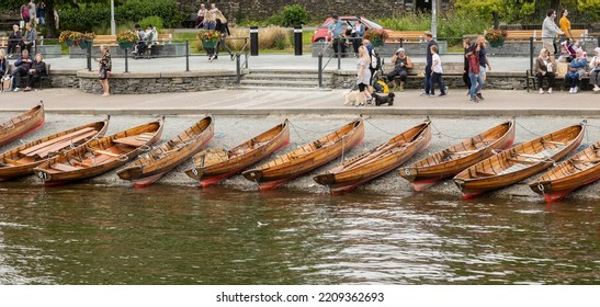 Windermere, United Kingdom June 18, 2022, Handcrafted Cedar Strip Canoes On Shore During The Summer Season