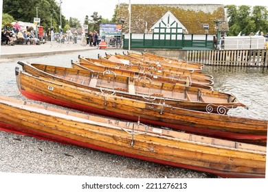 Windermere, United Kingdom June 18, 2022, Handcrafted Cedar Strip Canoes On Shore During The Summer Season