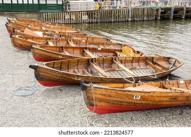 Windermere, United Kingdom June 18, 2022, Handcrafted Cedar Strip Canoes On Shore During The Summer Season