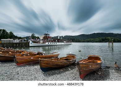 Windermere,England-July 27,2016:Lake Windermere, The Lake District, The Largest Natural Lake In England. Including Places To Stay Nearby, Activities, Watersports And Family Attractions.