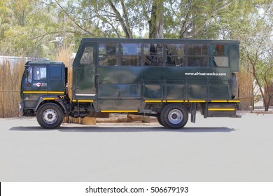 WINDHOEK, NAMIBIA, AFRICA - October 5, 2016. Offroad Safari Truck With Tourist Group At Safari Rest Camp Is Making An International Overland Travel Tour Through Different African Countries. 