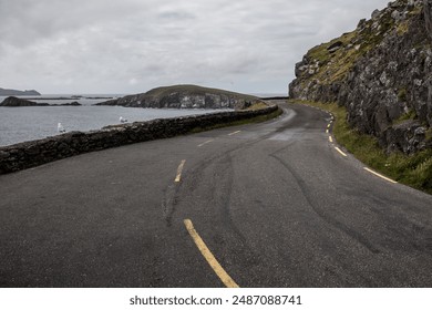 Winding Coastal Road Near the Cliffs of Moher in Ireland on a Cloudy Day - Powered by Shutterstock