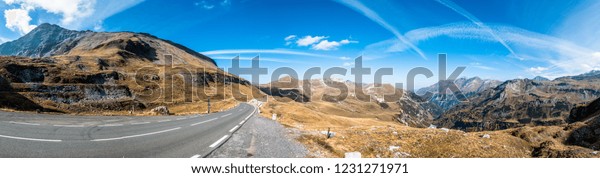 winding country road at the european alps -\
grossglockner mountain\
austria