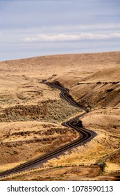 A Winding And Curvey Road In Eastern Washington High Desert Country