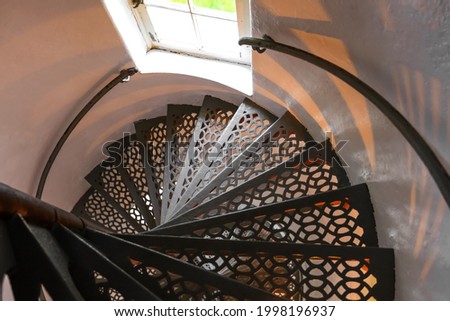 Winding metal stair case at McGulpin point lighthouse 
