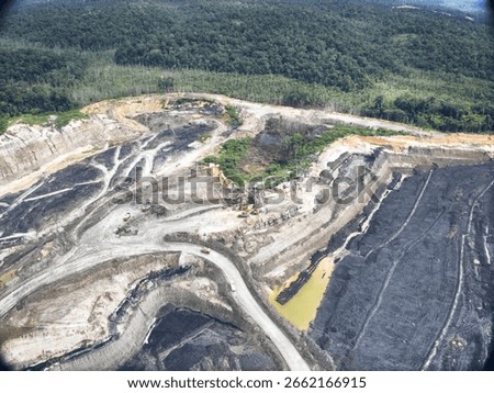 Winding Mining Roads Passing Through Deep Coal Extraction Layers
