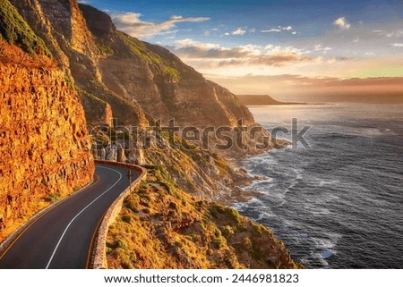 Winding mountain road with scenic views, narrow lanes, occasional curves.