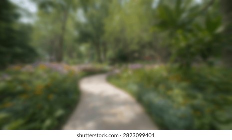 A winding paved pathway meanders through a vibrant botanical garden filled with diverse plants and blooming flowers.