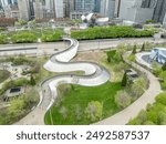 Winding pedestrian bridge with stainless steel panels in Chicago