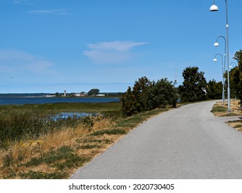 A winding road along the Baltic Sea coast.